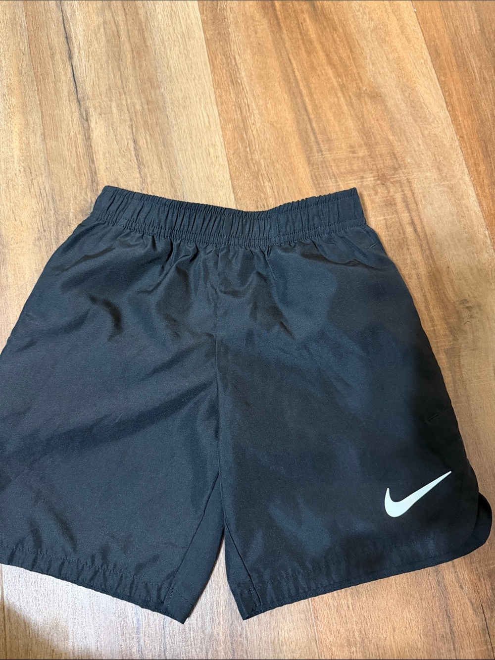 Nike Black Shorts with White Swoosh Logo